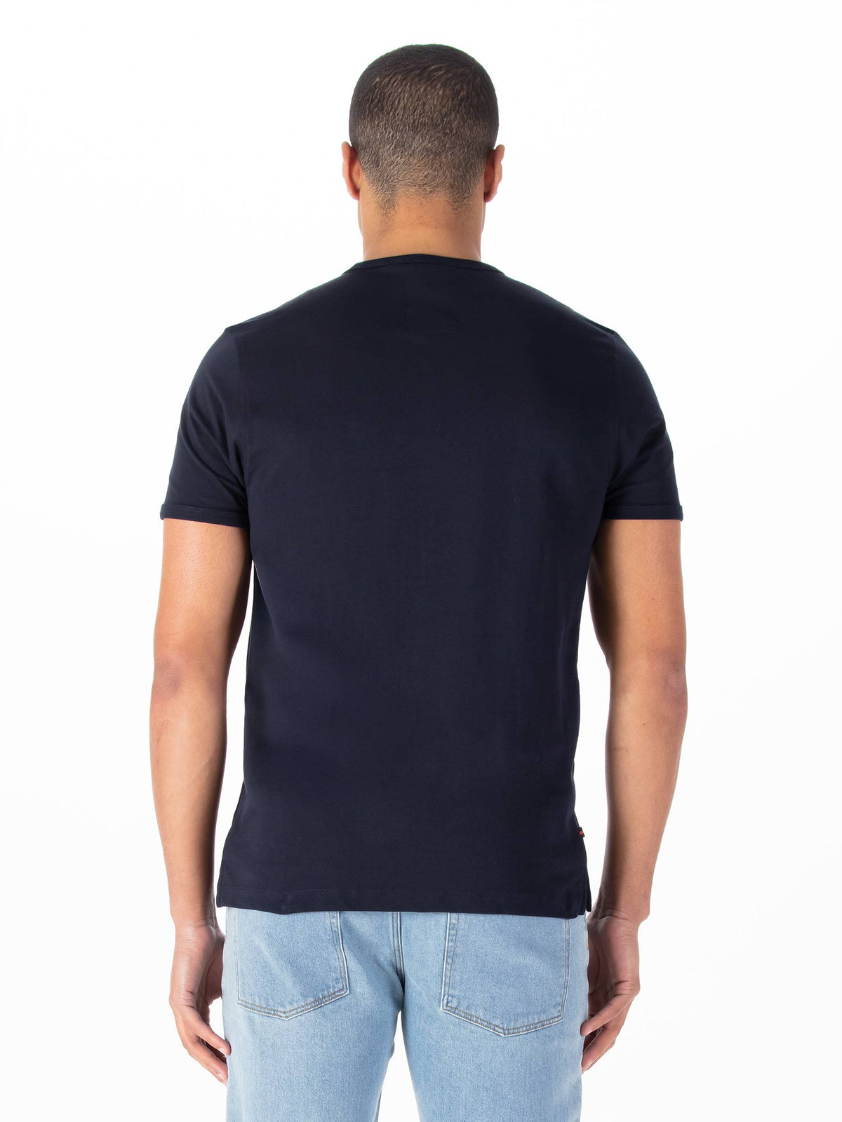 Men's navy t-shirt with crew neck and short sleeves worn by a model - back view.