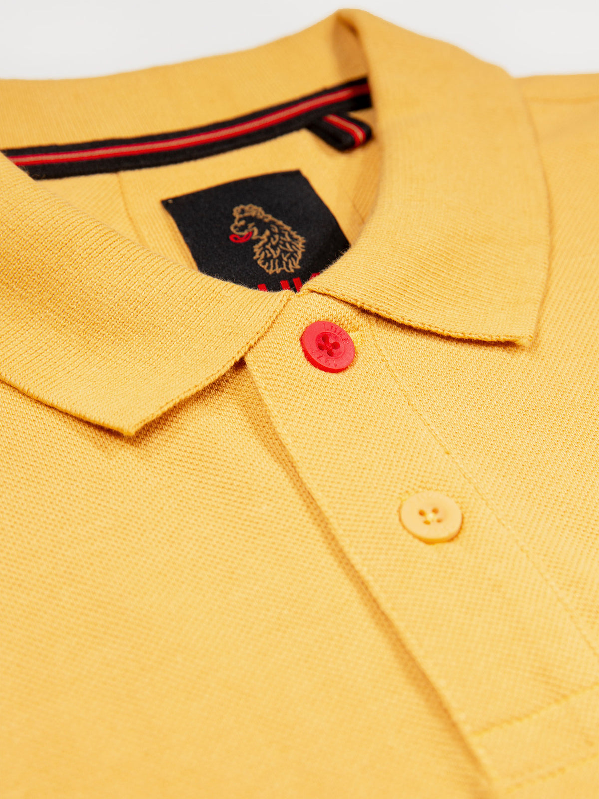 Men's yellow polo shirt with polo collar.