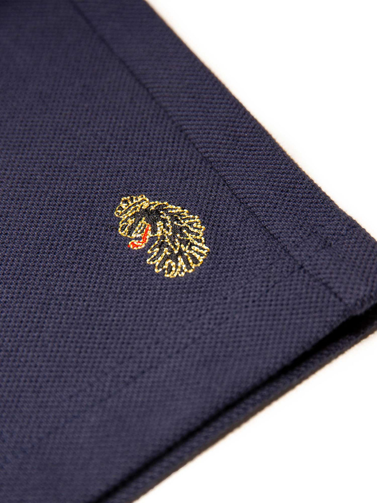 Men's navy short set with short-sleeve shirt and drawstring shorts, detail view.