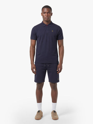 Men's navy short set with short-sleeve shirt and drawstring shorts, worn by model.