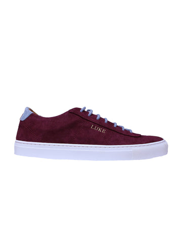 Boy's red suede trainers, side view
